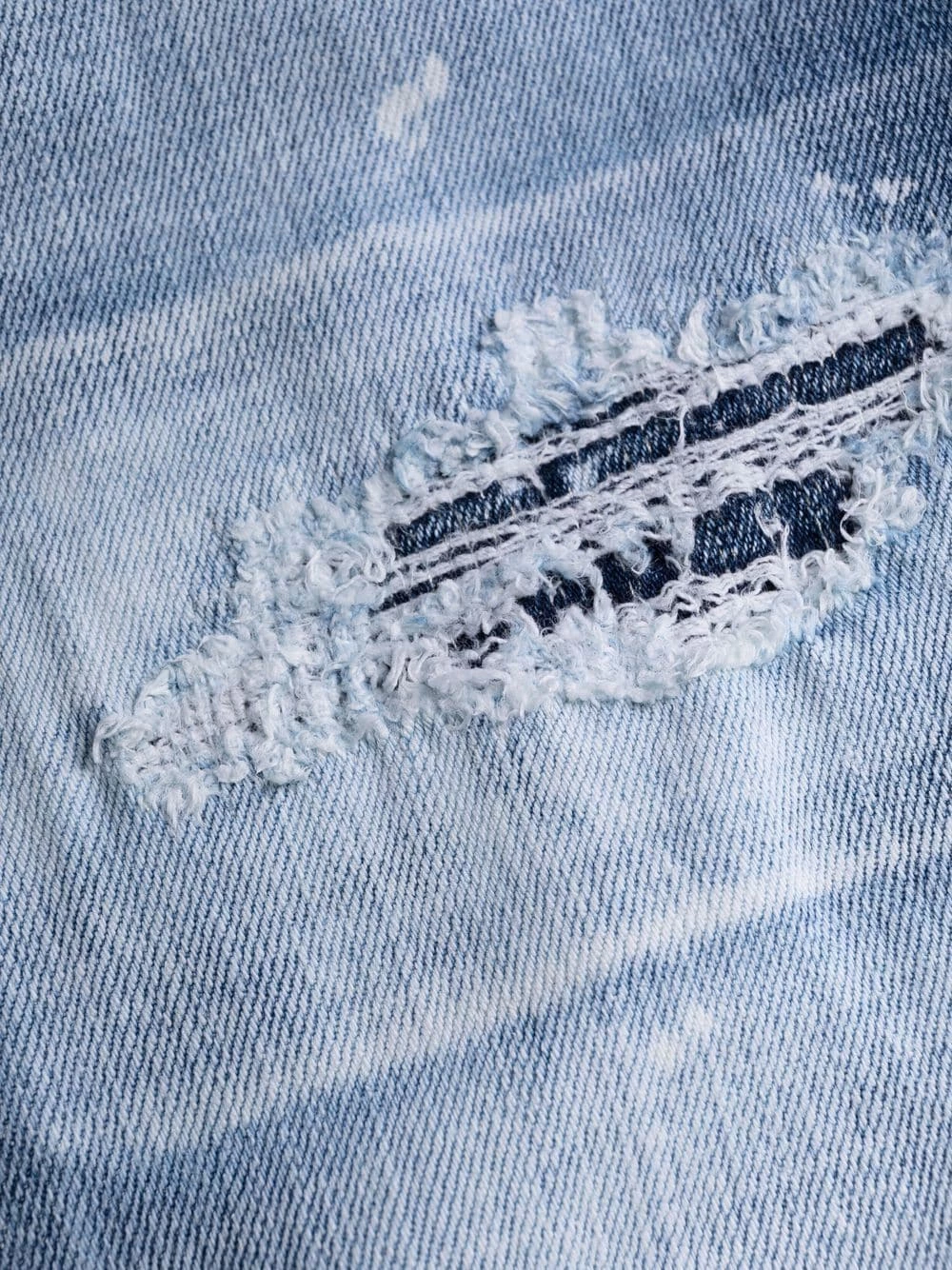 Dsquared2 Un Tarif Préférentiel Jean skinny à effet taches de peinture jeans skinny homme 9 Dsquared2 jean skinny à effet taches de peinture